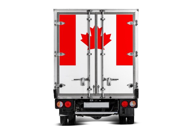 Un camion avec le drapeau national du Canada représenté sur le portemanteau roule sur un fond blanc Concept de transport d'exportation-importation livraison nationale de marchandises