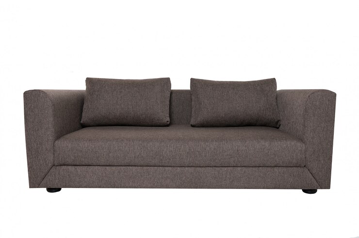 Canapé en tissu gris moderne avec des oreillers isolés sur blanc.