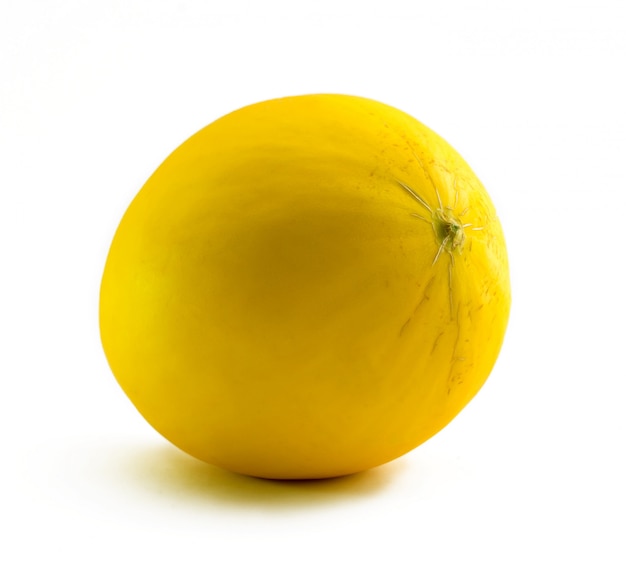 Photo cantaloup jaune isolé sur blanc