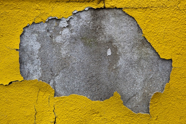 Capture complète du mur avec peinture jaune pelée