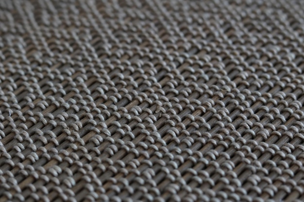 Photo capture complète d'un motif sur un tapis de bambou
