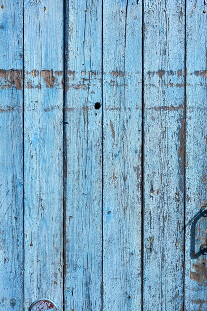 Photo capture complète d'un mur en bois altéré