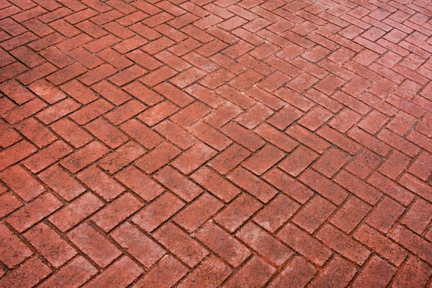 Carreaux de pavage à motifs, vieux fond de plancher de brique de ciment rouge