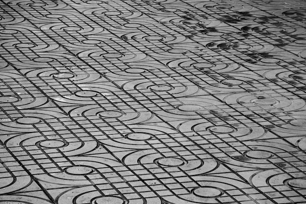 Carreaux de pavage à motifs, vieux fond de plancher de brique de ciment