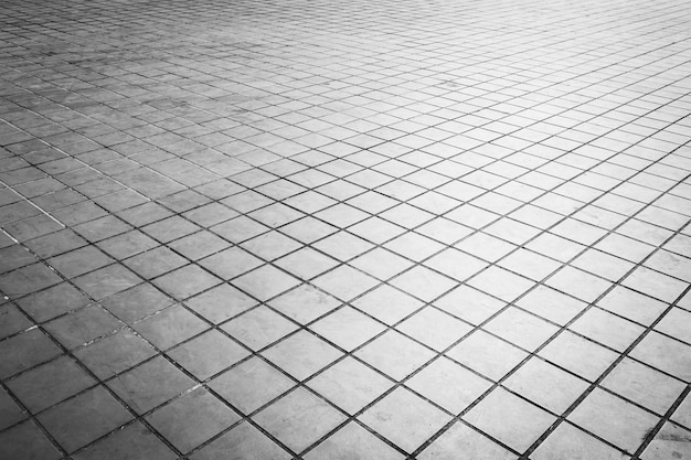 Photo carreaux de sol grunge et texture de forme carrée et arrière-plan