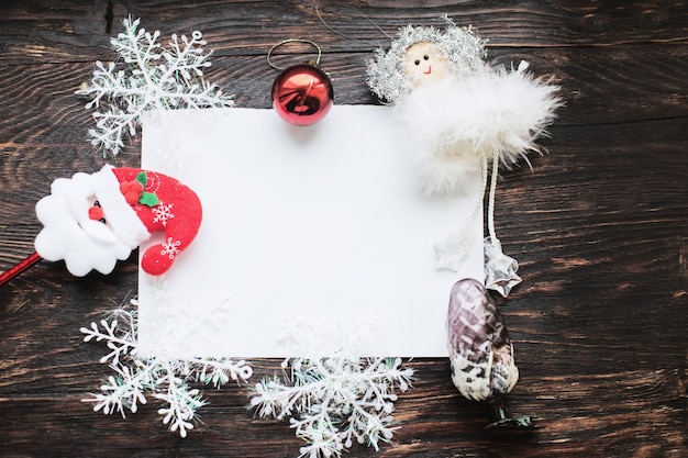 Photo carte de noël sur un fond en bois