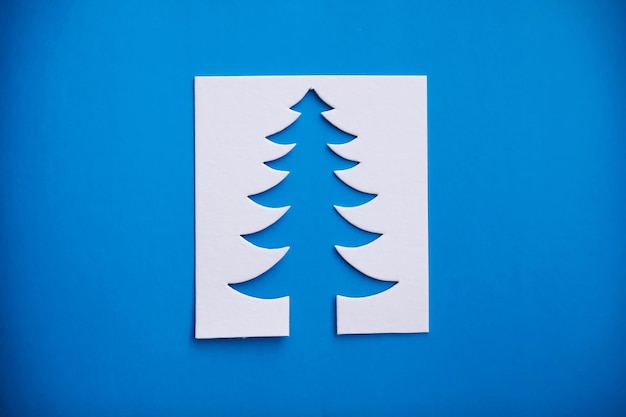 Carte de papercraft de conception de coupe de papier d'arbre de Noël