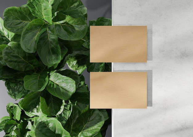 Cartes de visite en carton brun vierge avec des plantes Maquette naturelle pour l'identité de marque Deux cartes pour montrer les deux côtés Modèle pour le rendu 3D du graphiste