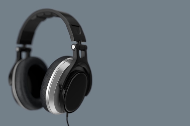 Casque noir sur fond gris. Rendu 3D