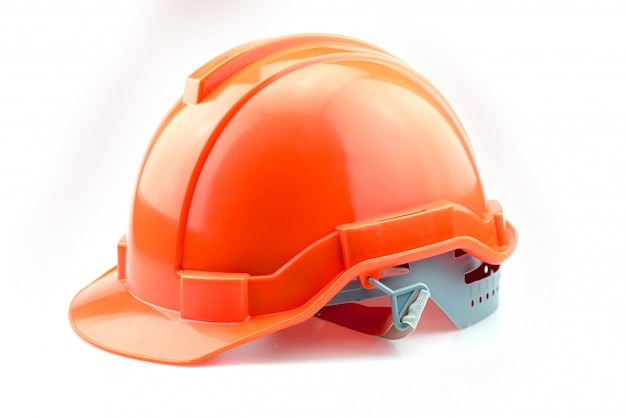 Casque orange isolé pour constructeur