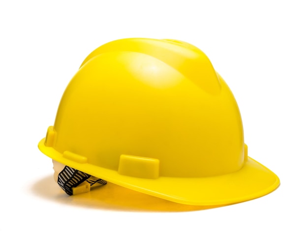 Casque de sécurité jaune isolé sur fond blanc