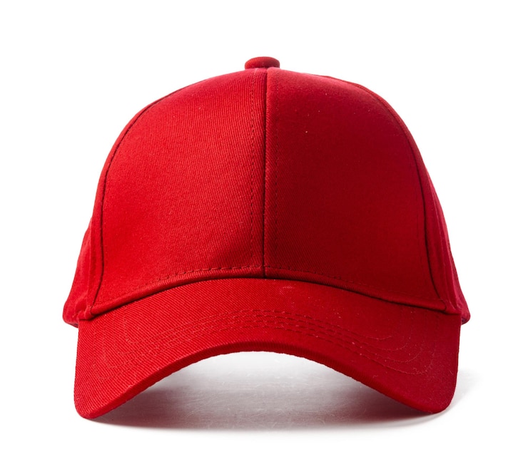 Photo une casquette de baseball rouge sur fond blanc