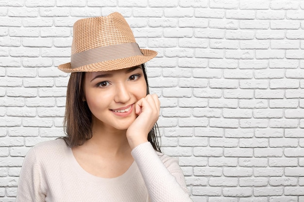 Casual mixed-race Asian Caucasian woman smiling looking happy