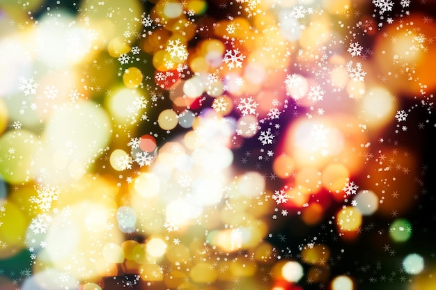 Célébration de la lumière abstraite. Lumières de couleur rougeoyante de Noël de vacances avec des étincelles, bokeh abstrait de Noël lumineux brouillé