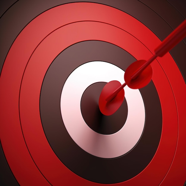 Le centre de fléchette de la flèche de fléchette rouge avec une lentille de gros plan la métaphore des objectifs réussis le concept de gagnants