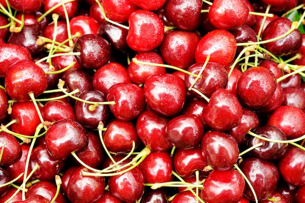 Cerises mûres rouges pour le fond se bouchent