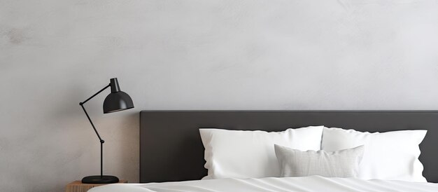 Photo chambre moderne avec un lit blanc, oreiller gris, lampe noire sur table en bois