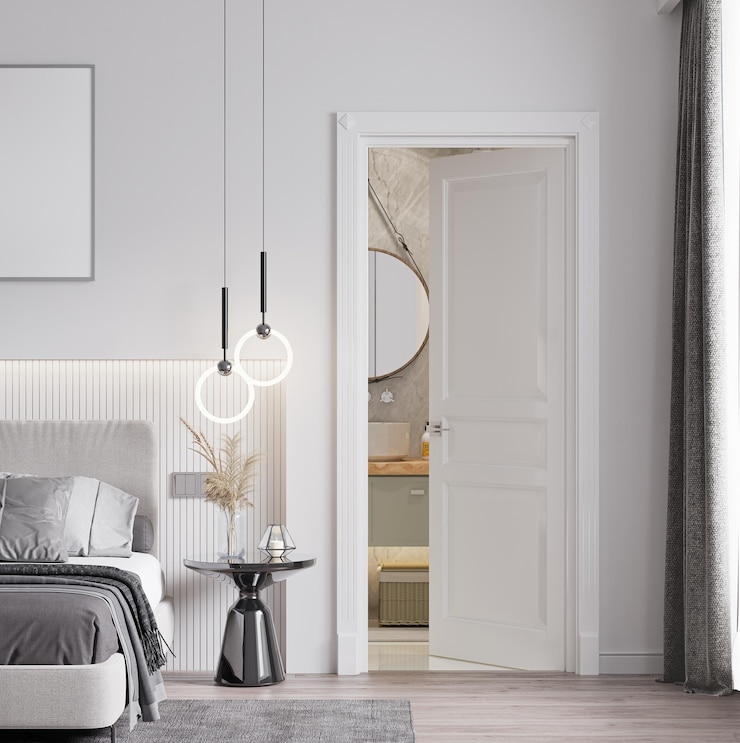 Photo chambre moderne avec salle de bain et lit au sol en bois avec table de chevet avec lumière suspendue doo blanc