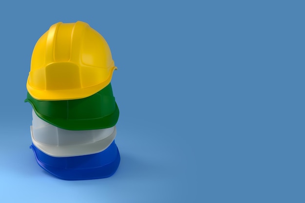 Chapeau de casque de sécurité dur blanc jaune vert et bleu pour le projet de sécurité d'ouvrier en tant qu'ingénieur ou ouvrier sur fond bleu rendu 3d