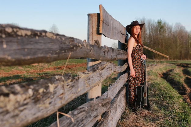 Chapeau de cow-girl avec guitare