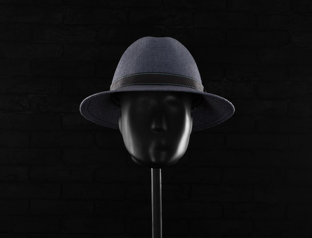 chapeau d'été sur un mannequin sur fond noir