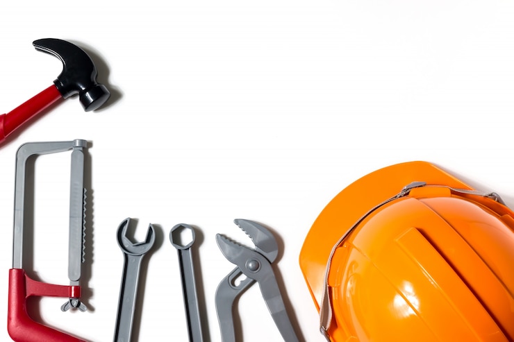 Photo les chapeaux, les ingénieurs et les techniciens sont des outils et sont utilisés dans la planification financière, la copie d&#39;espace.