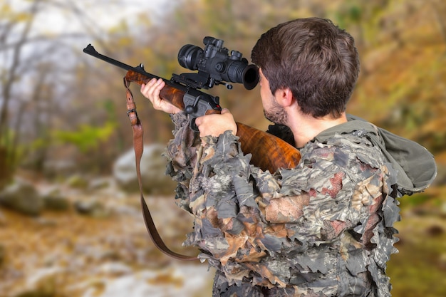 Chasseur avec son fusil