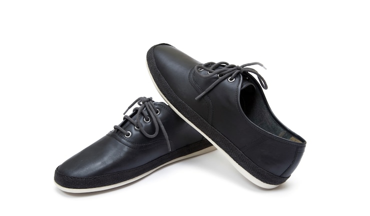 Photo chaussures noires isolés sur fond blanc