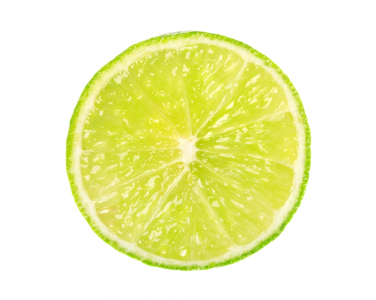 Photo chaux isolée sur un espace blanc. tranche ronde de citron vert juteux et frais. avec un tracé de détourage. vue de dessus