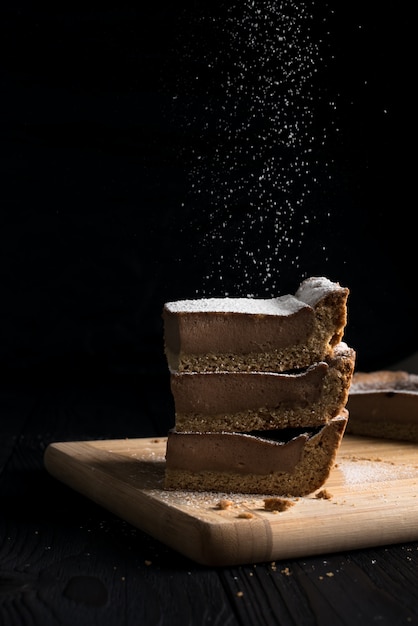 Cheesecake avec du sucre en poudre