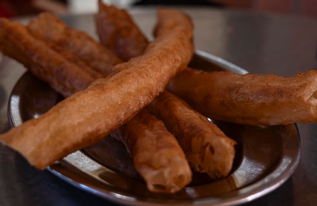 Photo les churros et le café, le charme de malaga