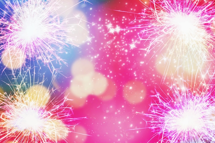 Photo cierges magiques sur fond multicolore, vacances de noël et du nouvel an