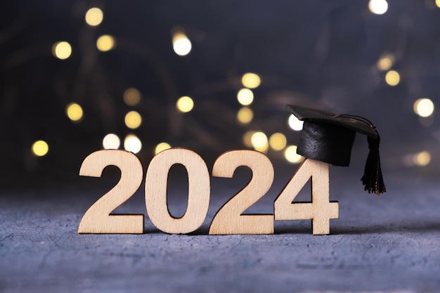 Classement de 2024 concept Numéro 2024 avec capuchon gradué et lumières bokeh