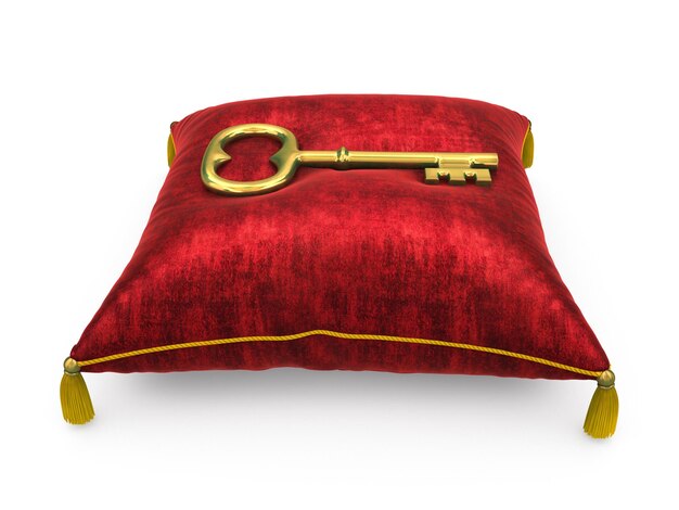 Clé d'or sur l'oreiller de velours rouge royal isolé sur fond blanc 4