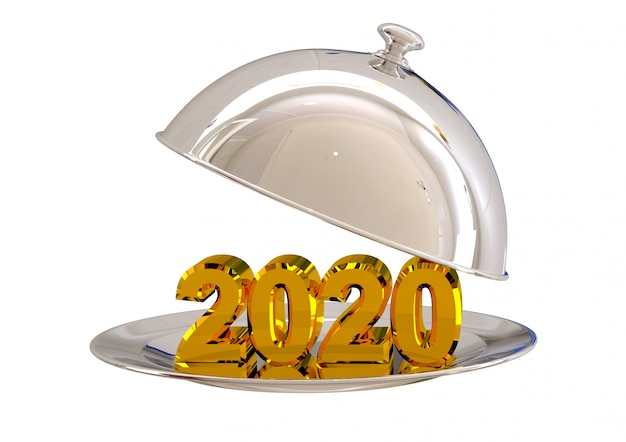 Photo cloche chrome ouverte avec nouvel an 2020 sur assiette au restaurant