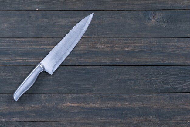 Close up couteau de cuisine sur une table en bois