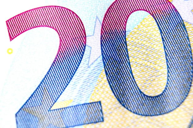 Close-up d'un fragment de billet de 20 euros sur le revers montrant le numéro de dénomination 20