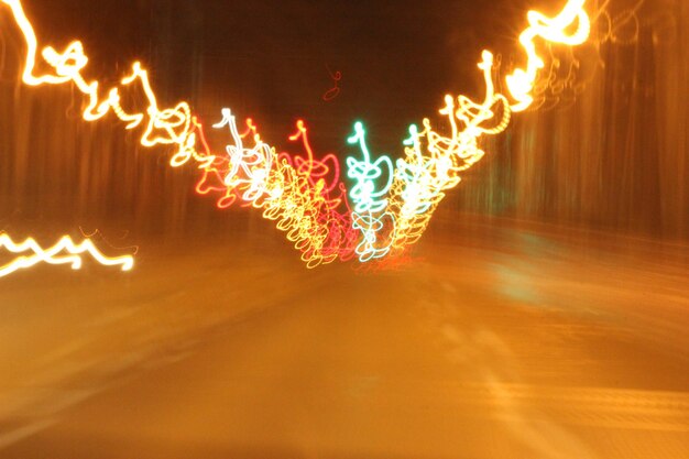 Photo close-up des lumières de noël éclairées la nuit