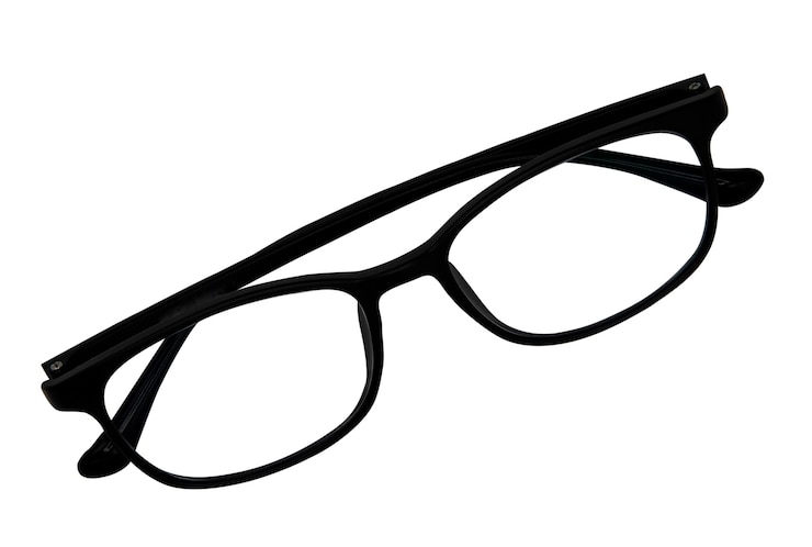 Photo close-up des lunettes sur un fond blanc