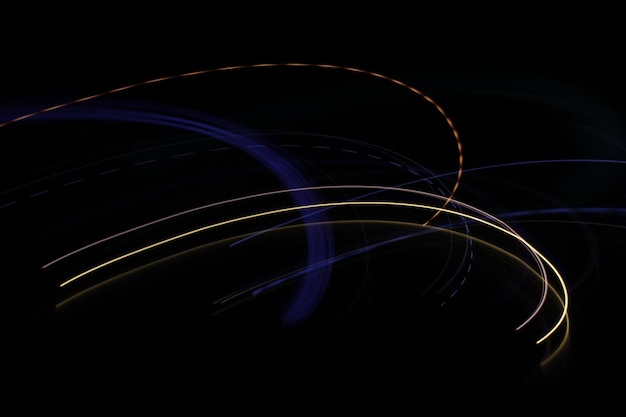 Close-up d'une peinture lumineuse sur fond noir