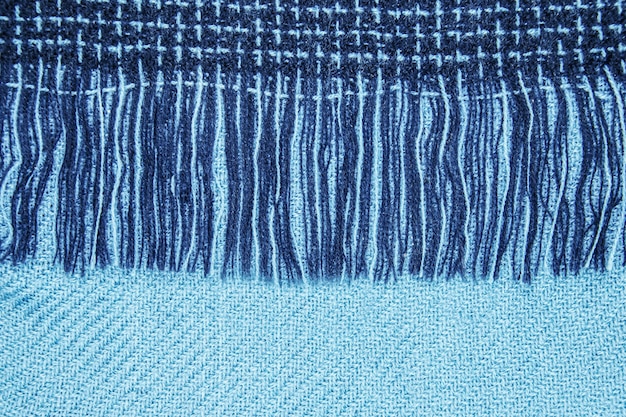 Close-up de texture de laine à carreaux fins en bleu