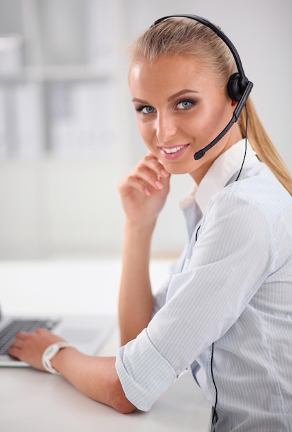 Closeup portrait of a customer service agent sitting at office