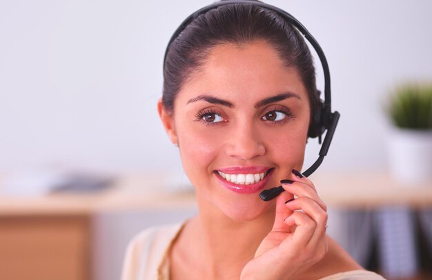 Closeup portrait of a customer service agent sitting at office