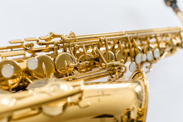 Closeup touches saxophone