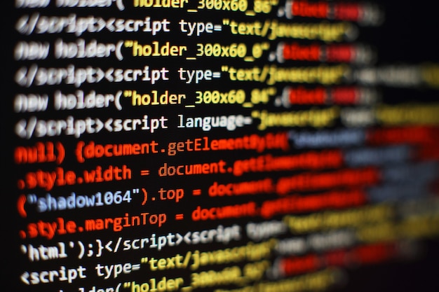 Photo code de programmation de développeur de logiciels. code de script informatique abstrait. mise au point sélective