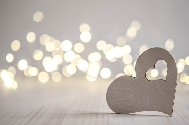 Coeur blanc, bokeh argenté et humeur joyeuse