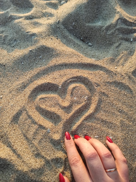 Un coeur dans le sable