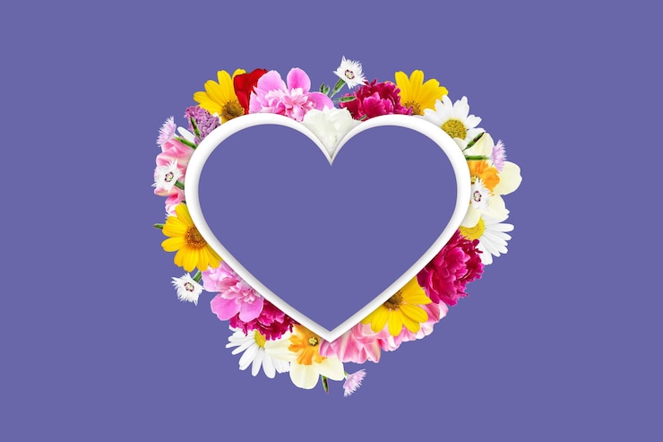 Photo coeur avec des fleurs sur un fond très péri saint valentin fête des mères couleur de l'année