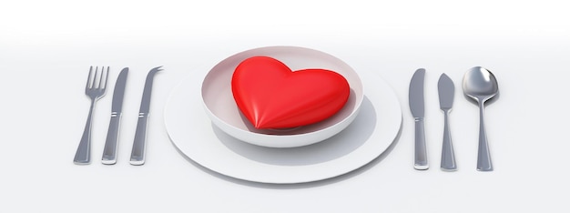 Coeur rouge sur un plat en porcelaine prêt à manger