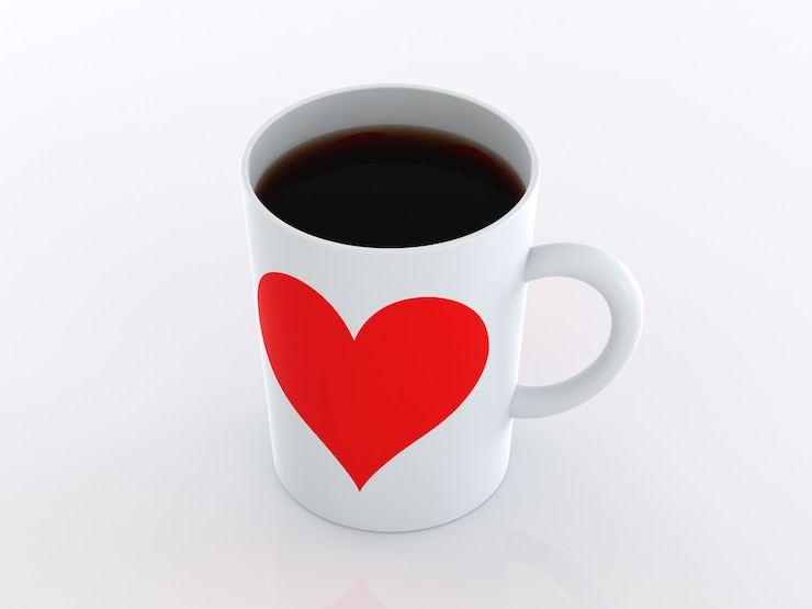 Photo coeur sur des tasses de café. isolé sur fond blanc.